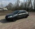 Серый Мицубиси Лансер, объемом двигателя 1.6 л и пробегом 250 тыс. км за 1200 $, фото 1 на Automoto.ua