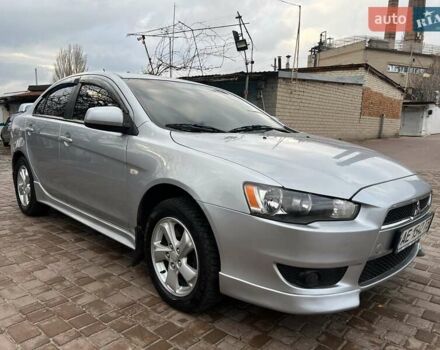 Серый Мицубиси Лансер, объемом двигателя 2 л и пробегом 180 тыс. км за 6799 $, фото 1 на Automoto.ua