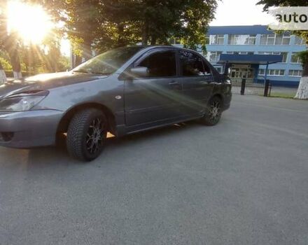 Сірий Міцубісі Lancer, об'ємом двигуна 1.6 л та пробігом 230 тис. км за 3950 $, фото 15 на Automoto.ua