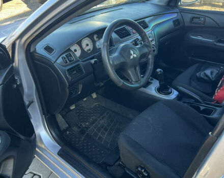 Серый Мицубиси Лансер, объемом двигателя 1.58 л и пробегом 178 тыс. км за 3300 $, фото 14 на Automoto.ua