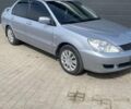 Сірий Міцубісі Lancer, об'ємом двигуна 1.6 л та пробігом 238 тис. км за 5500 $, фото 3 на Automoto.ua