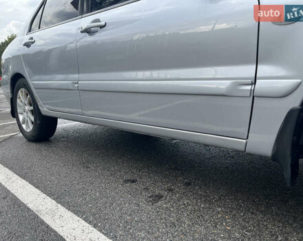 Серый Мицубиси Лансер, объемом двигателя 1.58 л и пробегом 232 тыс. км за 4900 $, фото 8 на Automoto.ua