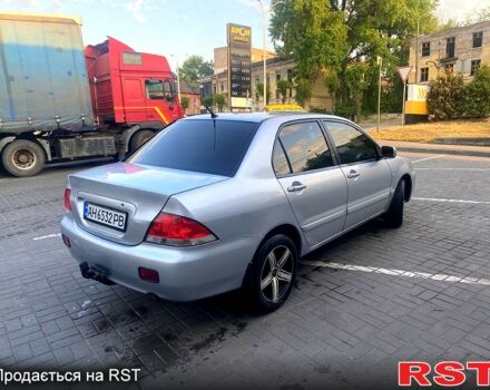 Сірий Міцубісі Lancer, об'ємом двигуна 1.6 л та пробігом 193 тис. км за 3999 $, фото 6 на Automoto.ua