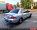 Сірий Міцубісі Lancer, об'ємом двигуна 1.6 л та пробігом 193 тис. км за 3999 $, фото 6 на Automoto.ua