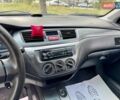 Сірий Міцубісі Lancer, об'ємом двигуна 1.58 л та пробігом 138 тис. км за 4990 $, фото 28 на Automoto.ua