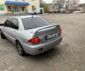 Серый Мицубиси Лансер, объемом двигателя 1.6 л и пробегом 380 тыс. км за 4000 $, фото 2 на Automoto.ua