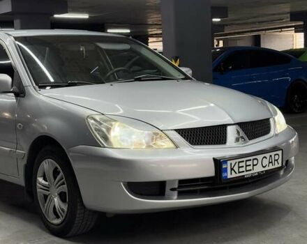 Серый Мицубиси Лансер, объемом двигателя 1.58 л и пробегом 271 тыс. км за 4200 $, фото 8 на Automoto.ua