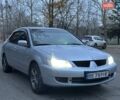 Серый Мицубиси Лансер, объемом двигателя 1.6 л и пробегом 210 тыс. км за 4600 $, фото 1 на Automoto.ua