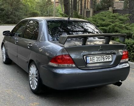 Серый Мицубиси Лансер, объемом двигателя 1.6 л и пробегом 250 тыс. км за 3999 $, фото 3 на Automoto.ua