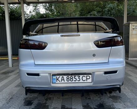 Серый Мицубиси Лансер, объемом двигателя 2 л и пробегом 244 тыс. км за 6500 $, фото 7 на Automoto.ua