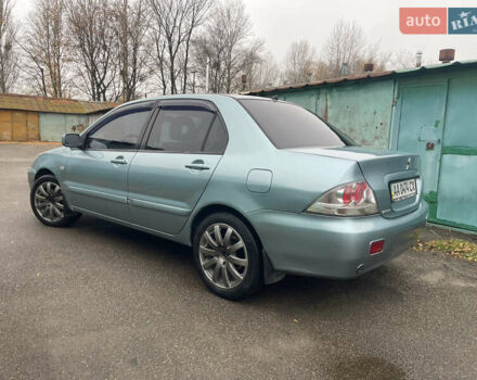 Серый Мицубиси Лансер, объемом двигателя 1.58 л и пробегом 205 тыс. км за 4750 $, фото 3 на Automoto.ua