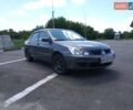 Серый Мицубиси Лансер, объемом двигателя 1.6 л и пробегом 188 тыс. км за 4999 $, фото 1 на Automoto.ua