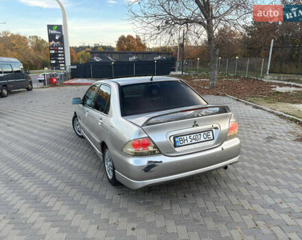 Серый Мицубиси Лансер, объемом двигателя 2 л и пробегом 184 тыс. км за 4900 $, фото 4 на Automoto.ua