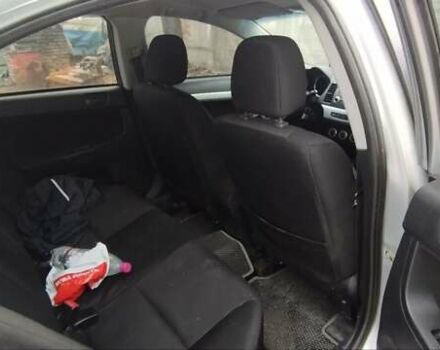 Серый Мицубиси Лансер, объемом двигателя 2 л и пробегом 305 тыс. км за 6300 $, фото 6 на Automoto.ua