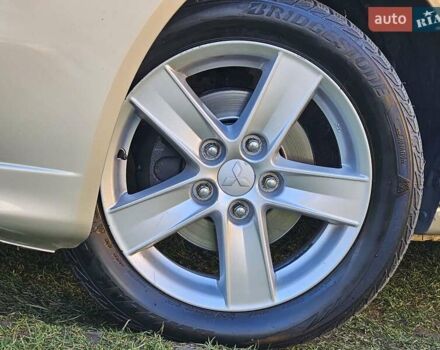 Серый Мицубиси Лансер, объемом двигателя 2 л и пробегом 282 тыс. км за 5450 $, фото 28 на Automoto.ua