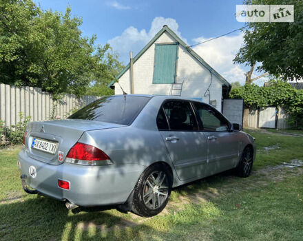 Сірий Міцубісі Lancer, об'ємом двигуна 1.6 л та пробігом 250 тис. км за 5500 $, фото 4 на Automoto.ua