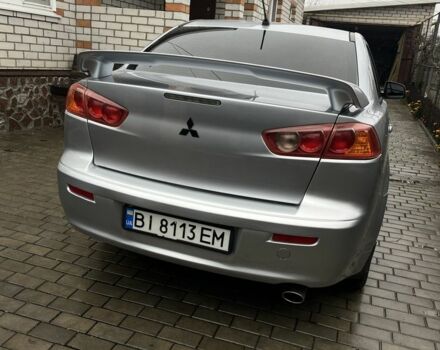 Серый Мицубиси Лансер, объемом двигателя 2 л и пробегом 227 тыс. км за 6600 $, фото 5 на Automoto.ua