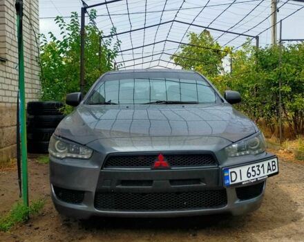 Серый Мицубиси Лансер, объемом двигателя 2 л и пробегом 351 тыс. км за 7000 $, фото 13 на Automoto.ua
