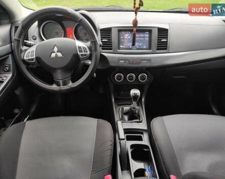 Сірий Міцубісі Lancer, об'ємом двигуна 2 л та пробігом 124 тис. км за 7499 $, фото 10 на Automoto.ua