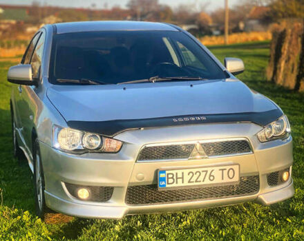 Серый Мицубиси Лансер, объемом двигателя 2 л и пробегом 226 тыс. км за 6200 $, фото 1 на Automoto.ua