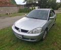 Сірий Міцубісі Lancer, об'ємом двигуна 1.6 л та пробігом 202 тис. км за 3995 $, фото 1 на Automoto.ua