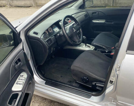 Серый Мицубиси Лансер, объемом двигателя 1.58 л и пробегом 240 тыс. км за 5500 $, фото 14 на Automoto.ua