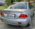 Сірий Міцубісі Lancer, об'ємом двигуна 1.58 л та пробігом 138 тис. км за 4990 $, фото 13 на Automoto.ua