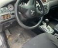 Сірий Міцубісі Lancer, об'ємом двигуна 1.58 л та пробігом 305 тис. км за 3300 $, фото 7 на Automoto.ua