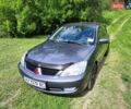Сірий Міцубісі Lancer, об'ємом двигуна 1.6 л та пробігом 131 тис. км за 5000 $, фото 1 на Automoto.ua