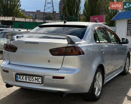 Серый Мицубиси Лансер, объемом двигателя 2 л и пробегом 150 тыс. км за 6100 $, фото 7 на Automoto.ua