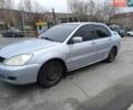 Сірий Міцубісі Lancer, об'ємом двигуна 1.6 л та пробігом 222 тис. км за 2200 $, фото 1 на Automoto.ua