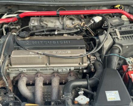 Серый Мицубиси Лансер, объемом двигателя 2 л и пробегом 185 тыс. км за 4600 $, фото 16 на Automoto.ua