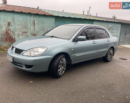 Серый Мицубиси Лансер, объемом двигателя 1.58 л и пробегом 205 тыс. км за 4750 $, фото 2 на Automoto.ua