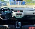 Серый Мицубиси Лансер, объемом двигателя 1.6 л и пробегом 130 тыс. км за 3999 $, фото 5 на Automoto.ua
