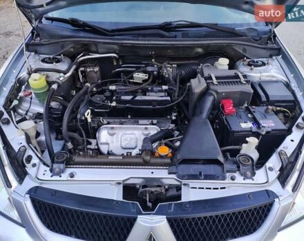 Сірий Міцубісі Lancer, об'ємом двигуна 1.58 л та пробігом 122 тис. км за 6300 $, фото 41 на Automoto.ua