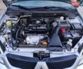 Сірий Міцубісі Lancer, об'ємом двигуна 1.58 л та пробігом 122 тис. км за 6300 $, фото 41 на Automoto.ua