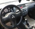 Серый Мицубиси Лансер, объемом двигателя 1.6 л и пробегом 222 тыс. км за 3300 $, фото 4 на Automoto.ua