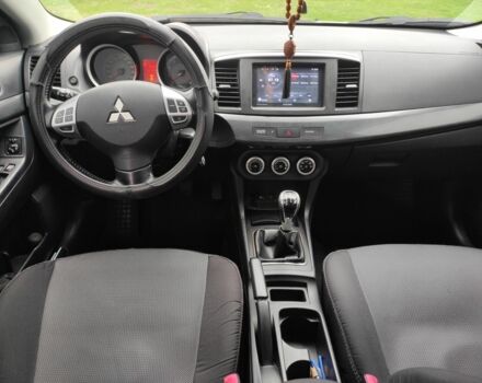 Серый Мицубиси Лансер, объемом двигателя 2 л и пробегом 124 тыс. км за 7499 $, фото 7 на Automoto.ua