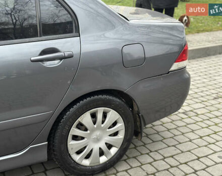 Сірий Міцубісі Lancer, об'ємом двигуна 1.6 л та пробігом 177 тис. км за 2800 $, фото 2 на Automoto.ua