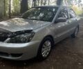 Сірий Міцубісі Lancer, об'ємом двигуна 1.6 л та пробігом 251 тис. км за 4292 $, фото 1 на Automoto.ua