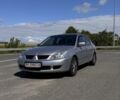 Серый Мицубиси Лансер, объемом двигателя 1.6 л и пробегом 113 тыс. км за 4900 $, фото 2 на Automoto.ua