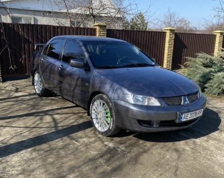 Серый Мицубиси Лансер, объемом двигателя 1.6 л и пробегом 250 тыс. км за 3999 $, фото 23 на Automoto.ua