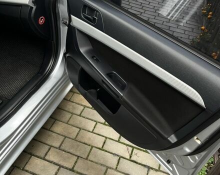 Серый Мицубиси Лансер, объемом двигателя 2 л и пробегом 227 тыс. км за 6600 $, фото 11 на Automoto.ua