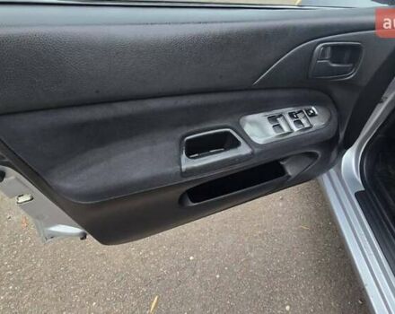 Сірий Міцубісі Lancer, об'ємом двигуна 1.6 л та пробігом 213 тис. км за 3600 $, фото 16 на Automoto.ua