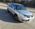 Серый Мицубиси Лансер, объемом двигателя 1.6 л и пробегом 270 тыс. км за 3000 $, фото 1 на Automoto.ua