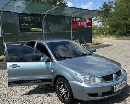 Сірий Міцубісі Lancer, об'ємом двигуна 1.58 л та пробігом 180 тис. км за 4400 $, фото 4 на Automoto.ua