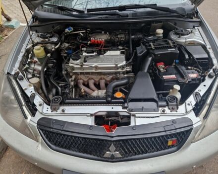 Серый Мицубиси Лансер, объемом двигателя 2 л и пробегом 231 тыс. км за 4500 $, фото 7 на Automoto.ua