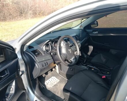 Серый Мицубиси Лансер, объемом двигателя 2 л и пробегом 180 тыс. км за 5800 $, фото 5 на Automoto.ua