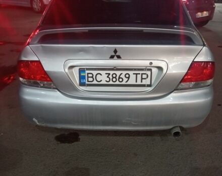 Серый Мицубиси Лансер, объемом двигателя 1.6 л и пробегом 308 тыс. км за 3800 $, фото 1 на Automoto.ua