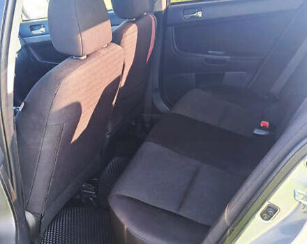 Серый Мицубиси Лансер, объемом двигателя 2 л и пробегом 226 тыс. км за 6200 $, фото 8 на Automoto.ua